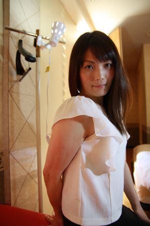 Professional Japanese cougar knows her way around a hard cock - Photo 38