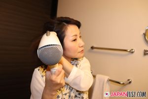 Japanese MILF seduces with toy play, then screams in wild climax - Photo 39
