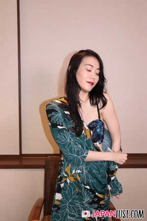 Tomoko, in a dimly lit room, spreads her legs, exposing her bushy cunt before sex - Photo 145