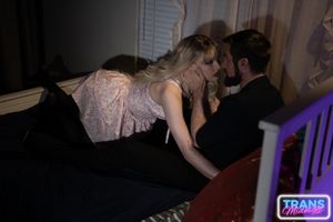 August, a gorgeous blonde trans beauty in stockings, is fucked hard by a stud in a dark, passionate night.  - Photo 141