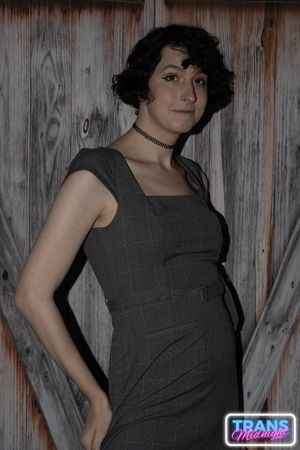 On a dark, passionate night, a black man with a huge cock fucks Elle, a stunning brunette trans woman in stockings, small tits, and a beautiful dick.  - Photo 1