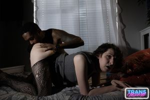 On a dark, passionate night, a black man with a huge cock fucks Elle, a stunning brunette trans woman in stockings, small tits, and a beautiful dick.  - Photo 109