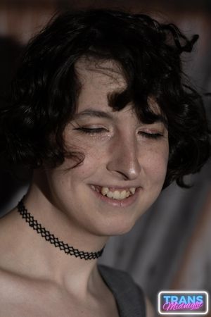 On a dark, passionate night, a black man with a huge cock fucks Elle, a stunning brunette trans woman in stockings, small tits, and a beautiful dick.  - Photo 17