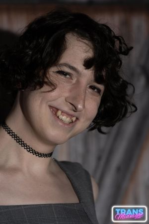 On a dark, passionate night, a black man with a huge cock fucks Elle, a stunning brunette trans woman in stockings, small tits, and a beautiful dick.  - Photo 19