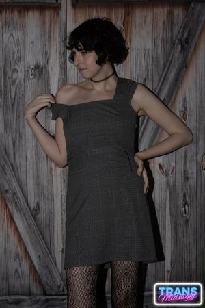 On a dark, passionate night, a black man with a huge cock fucks Elle, a stunning brunette trans woman in stockings, small tits, and a beautiful dick.  - Photo 2