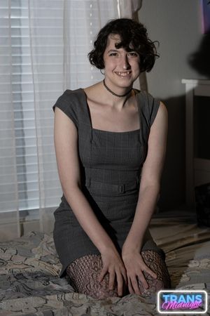 On a dark, passionate night, a black man with a huge cock fucks Elle, a stunning brunette trans woman in stockings, small tits, and a beautiful dick.  - Photo 23