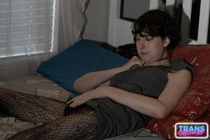 On a dark, passionate night, a black man with a huge cock fucks Elle, a stunning brunette trans woman in stockings, small tits, and a beautiful dick.  - Photo 35
