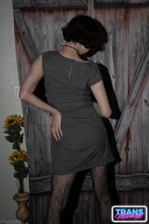 On a dark, passionate night, a black man with a huge cock fucks Elle, a stunning brunette trans woman in stockings, small tits, and a beautiful dick.  - Photo 7