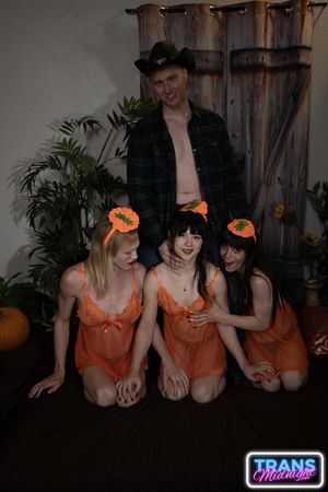 Cailey, Dixie, and Nyxi, hot transsexuals, fuck each other's asses with their hard cocks on Halloween, pleasing a lucky guy - Photo 322