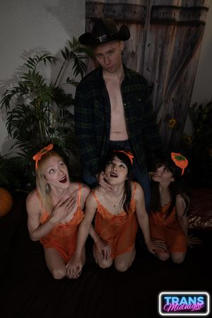 Cailey, Dixie, and Nyxi, hot transsexuals, fuck each other's asses with their hard cocks on Halloween, pleasing a lucky guy - Photo 330