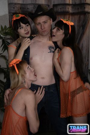 Cailey, Dixie, and Nyxi, hot transsexuals, fuck each other's asses with their hard cocks on Halloween, pleasing a lucky guy - Photo 342
