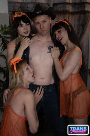 Cailey, Dixie, and Nyxi, hot transsexuals, fuck each other's asses with their hard cocks on Halloween, pleasing a lucky guy - Photo 346