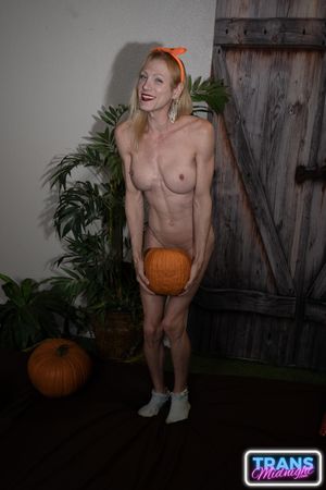 Cailey, Dixie, and Nyxi, hot transsexuals, fuck each other's asses with their hard cocks on Halloween, pleasing a lucky guy - Photo 66