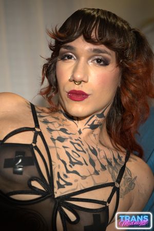 Midnight Delight: A Brunette's Tattooed Passion - Photo 45