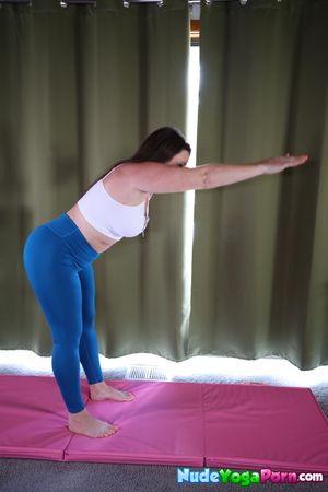 Micha stretches in yoga, strips piece by piece, then rubs her pussy until she squirts all over the mat. - Photo 20